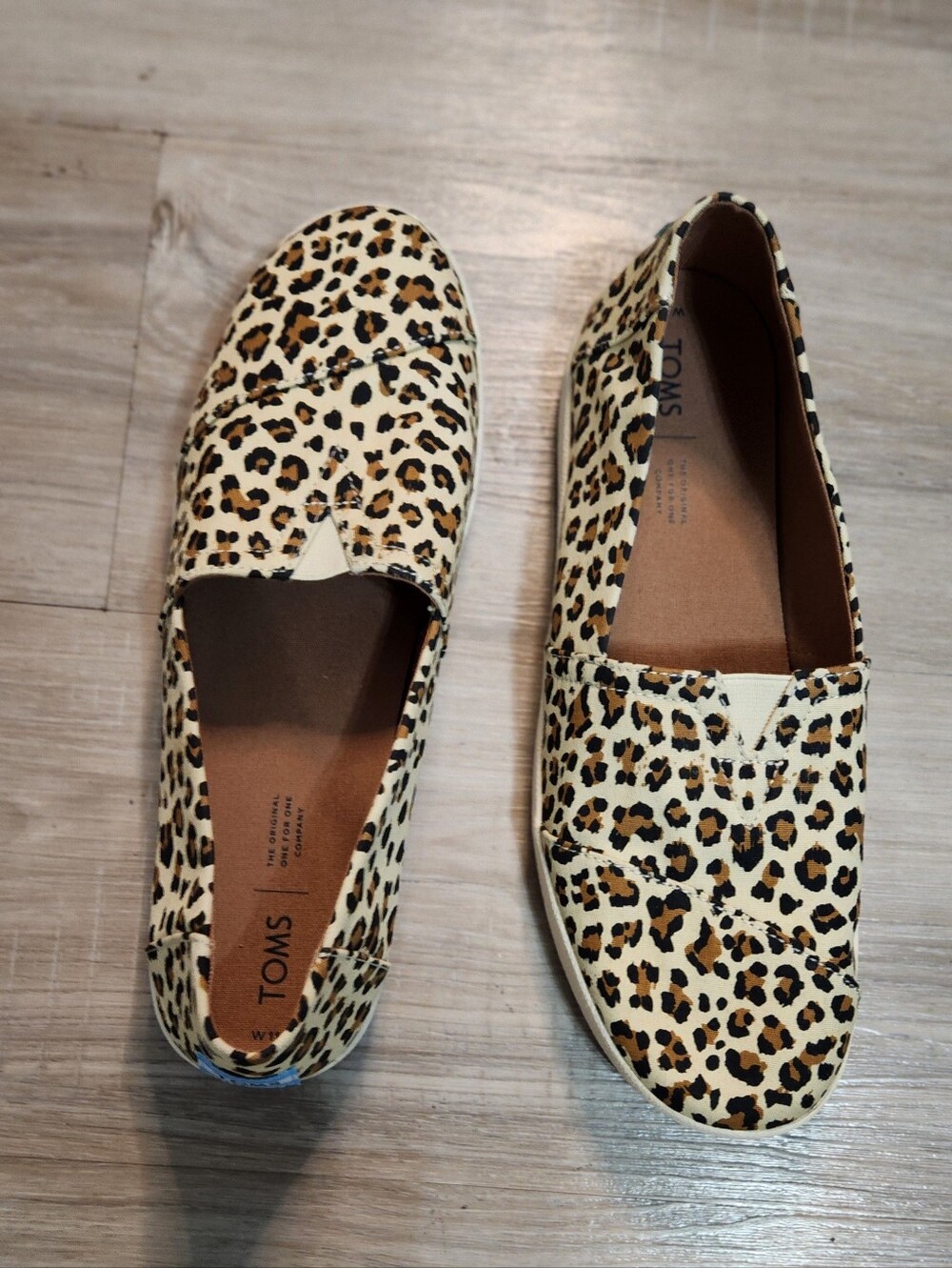 TOMS Women's Leopard Print Slip-On Flats in Tan and Black